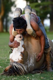 Argentina, Buenos Aires Province, San Antonio de Areco, estancia La Bamba de Areco, demonstration of the skills of an Amerindian rider with his horse, the kiss to the horse