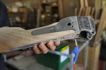 Italy, Lombardy, province of Brescia, Gardone Val Trompia, Davide Pedersoli & C manufacturer specialized in the production of historical muzzleloading guns, mounting of the butt