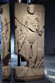 France, Haut Rhin, Hautes-Vosges, Col de la Schlucht, discovery area that allows you to understand the history of this emblematic place in the Vosges, stele representing the God Vosegus as a hunter with a deer behind him