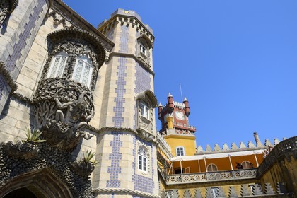 Portugal, Lisbon Region, Sintra, Pena National Palace (Palacio Nacional da Pena) listed as World Heritage by UNESCO, the depiction of a newt symbolizing the allegory of creation of the world and the clock tower