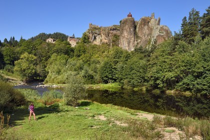 France, Haute Loire, Loire river Valley, Arlempdes, labelized the Most Beautiful Villages of France, ruins of the castle perched on a basalt rock (volcanic dyke) overlooking a Loire river meander that follows a hiker