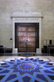 United Kingdom, London, United Grand Lodge of England, sculpted bronze door and mosaic on the ground