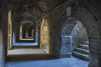 France, Bouches du Rhone, Arles,  listed as World heritage by UNESCO, the interior gallery with semi-circular vault and access to the stands