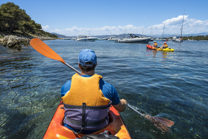 France, Alpes-Maritimes, Cannes, kayaking in the Lerins Islands, passage in the stretch of sea between the two islands of Lérins, the islands of Saint-Honorat and Sainte-Marguerite