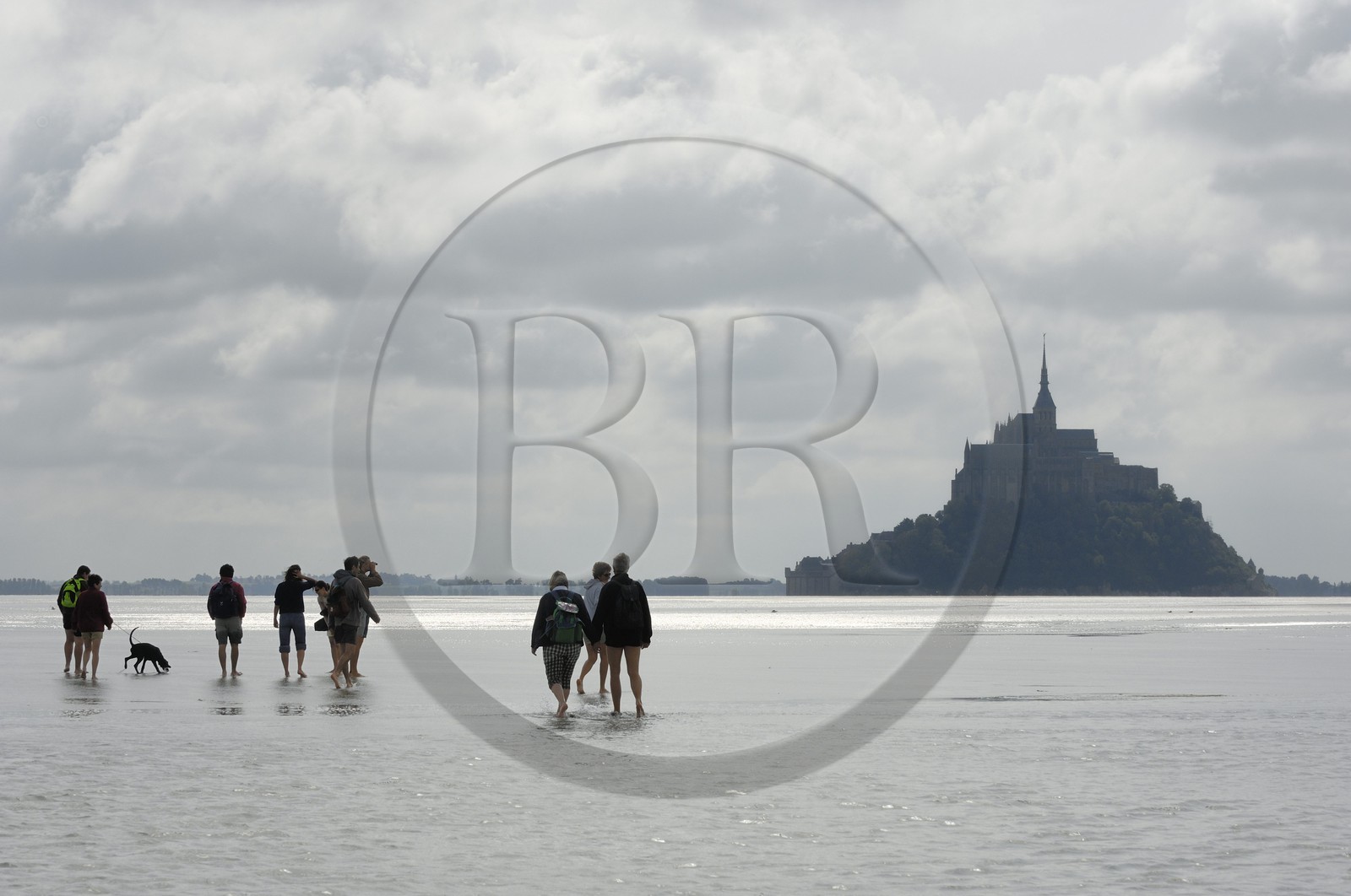 France, Manche, crossing on foot the Bay of Mont Saint Michel, listed as World Heritage by UNESCO