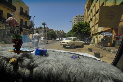 Egypt, Upper Egypt, Nubia, Nile Valley, Aswan, the city seen from the inside of a local taxi