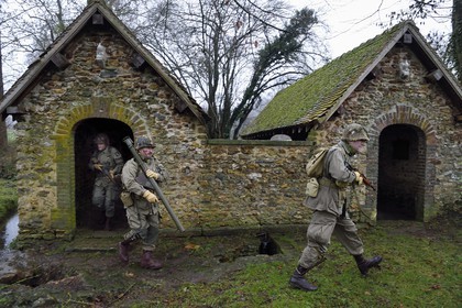 France, Eure, old wash-house of Sainte Colombe prés Vernon, Allied Reconstitution Group (US World War 2 and french Maquis historical reconstruction Association), reenactors in uniform of the 101st US Airborne Division
