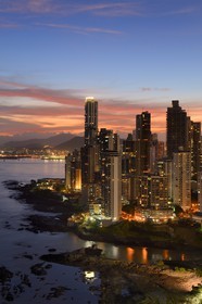 Panama, Panama City, waterfront skyscrapers of Punta Paitillia district after sunset