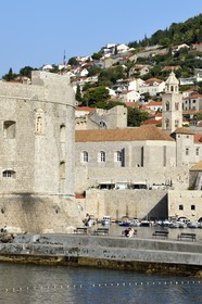 Croatia, Dalmatia, Dalmatian coast, Dubrovnik, Historic Centre listed as World Heritage by UNESCO, the ramparts on the sea side and the Saint Jean Tower building at the entrance to the Port
