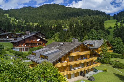 Switzerland, Canton of Vaud, Villars-sur-Ollon, chalet Les Myrtes route de la résidence at Chessières (aerial view)