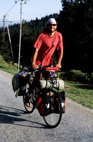 France, Pyrenees Orientales, Capcir region, cycle hiker in the valley carrying out to the lake of Bouillouses