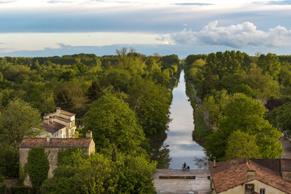 France, Vendee, Bouillé Courdault, the river port of Courdault at the end of the Vieille-Autise canal, silhouette of a cyclist on the Vendée Vélo Tour cycle route (aerial view)