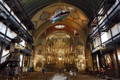 France, Pyrenees Atlantiques, Basque Country, Saint Jean de Luz, the Saint-Jean-Baptiste (Saint John the Baptist) Church, 17th century altarpiece in gilded wood and the wooden galleries of the nave