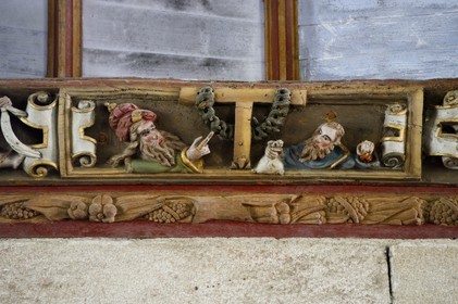France, Finistere, Pleyben church, wooden painted sculptures on the stringer decorating the vault