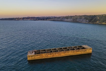 France, Calvados, Arromanches les Bains, cliffs of Cap Manvieux, Mulberry B remains, Port Winston, Phoenix breakwaters (aerial view)