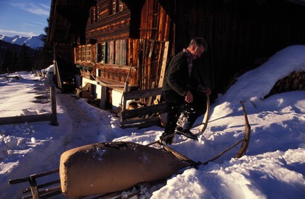 Switzerland, region of Bern (Bernese Oberland), Saanenland, sledge and traditional farm in Gstaad