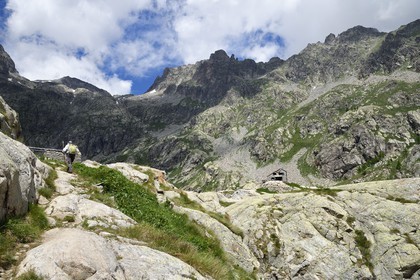 France, Alpes-Maritimes, parc national du Mercantour (Mercantour National Park), Valmasque valley, Valmasque mountain hut (FFCAM) at 2233m, and the Breche of Charnassere in the background