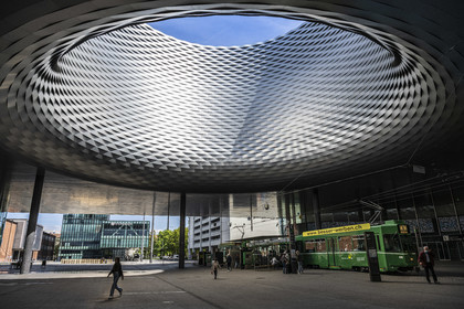 Switzerland, Basel, Messeplatz (Art Basel), the building of the Salon de Bâle called the City Lounge designed by the architects Herzog and de Meuron, the characteristic hole is called Fenster zum Himmel (window on the sky)