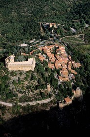 France, Pyrenees Orientales, Aspres region, medieval Castelnou village, labelled Les Plus Beaux Villages de France (The Most Beautiful Villages of France) (aerial view)