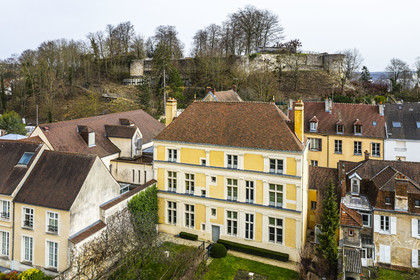 France, Aisne, Château-Thierry, Jean de La Fontaine Museum - city of Chateau-Thierry in the birthplace of the poet and writer, the Renaissance facade on the garden side and the ruins of the castle in the background