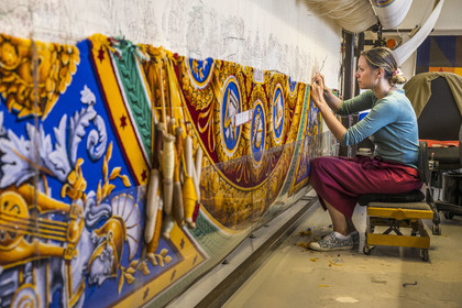 France, Herault, Lodève, Manufacture de la Savonnerie (Savonnerie manufactory) unique annex of the National Carpet Factory of the Savonnerie des Gobelins in Paris, manufacture of the Cohortes carpet after a model by Jacques-Louis de la Hamayde de Saint-Ange intended for the Palace of the Legion of Honor, the weaver Morgane Pognard unravels the colors on the loom