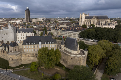France, Loire Atlantique, Nantes, Bouffay district, the castle of the Dukes of Brittany and the Saint Peter and Saint Paul Cathedral in the background (aerial view)