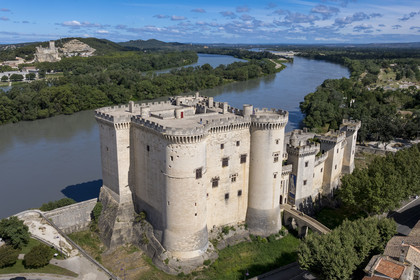 France, Bouches du Rhone, Tarascon, King René's castle dating from the 15th century on the banks of the Rhone and the Beaucaire fortress in the background on the other bank (aerial view)