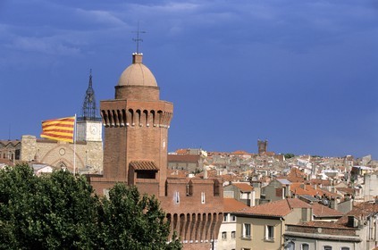 France, Pyrenees Orientales, Perpignan, old town and the Castillet with the catalan flag, part of the old walls
