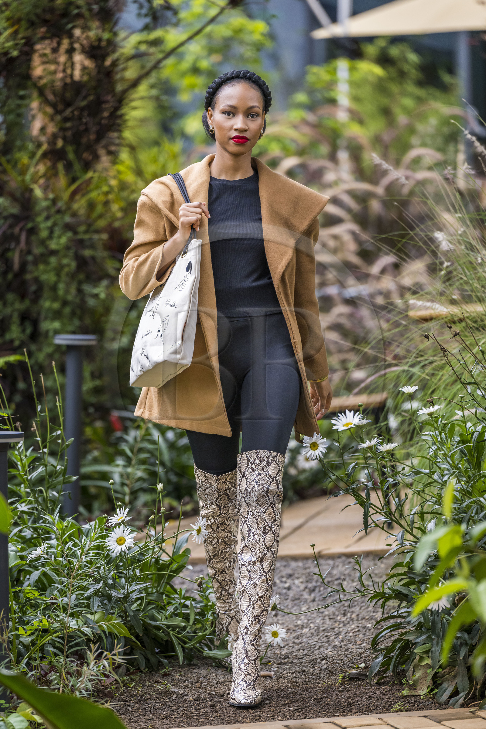 Rwanda, Kigali, Norrsken House Kigali, model Winnie Shema Tumusiime showcases Flove brand bag collection made in Rwanda