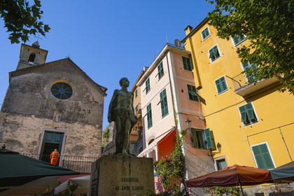 Italy, Liguria, Cinque Terre National Park listed as World Heritage by UNESCO, village of Corniglia, the oratory of the Disciplinati di Santa Caterina and the war memorial in the main square Largo Taragio