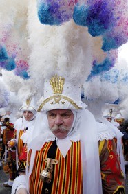 Belgium, Wallonia, Carnival of Binche, Gilles of Binche in the procession wearing their hat and throwing oranges