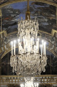 France, Yvelines, Chateau de Versailles, listed as World Heritage by UNESCO, Galerie des Glaces (Hall of Mirrors), architect Jules Hardouin Mansart (1678-1684), detail of a ceiling light