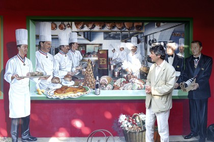 France, Rhone, Collonges au Mont d'Or, L'Auberge du Pont de Collonges Paul Bocuse Restaurant, painted wall portraying chefs who have collaborated with Bocuse