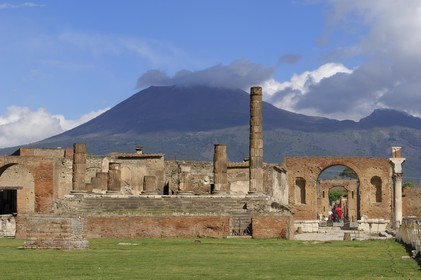 Italy, Campania, Pompei, archeological site listed as World Heritage by UNESCO, the Forum, the temple of Jupiter with Vesuvius in the background