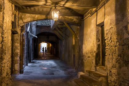 France, Alpes-Maritimes, old town, the rue Obscure (dark street) dating from the 14th century