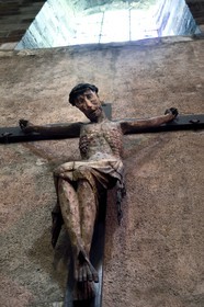 France, Haute Loire, Brioude, the Basilica of Saint-Julien de Brioude in Auvergne Romanesque style, the Christ of the Bajeasse also called the leper Christ of the 15th century, he wears a hemp crown