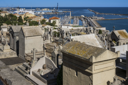 France, Herault, Sète, Saint-Charles cemetery known as the Marin cemetery and the port in the background