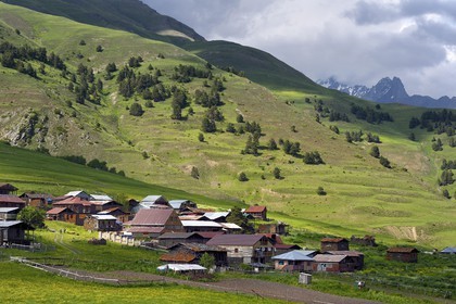 Georgia, Kakheti, Tusheti National Park, village of Diklo at the Dagestan (Russia) border in the background