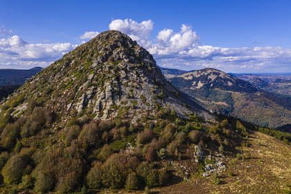 France, Ardeche, parc naturel regional des Monts d'Ardeche (Regional natural reserve of the Mounts of Ardeche), Mont Gerbier de Jonc (altitude of 1551m), source of the Loire river, the Suc de Sara mountain in the middle distance and the Roches de Borée mountain in the background (aerial view)