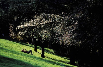 France, Paris, nap time in the Buttes Chaumont Park (English style garden)