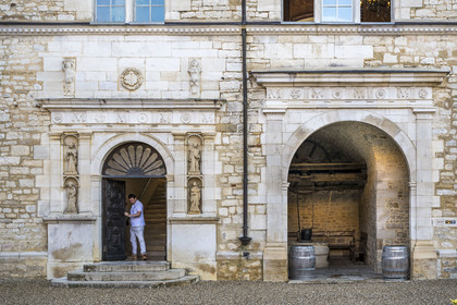 France, Cote d'Or, cultural Landscape of the climates of Burgundy listed as World Heritage by UNESCO, Route des Grands Crus (road of Vintage Wines), vineyard of the Côte de Nuits, Vougeot, the Chateau of Clos de Vougeot, the Renaissance staircase entrance and the 12th century well