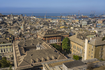Italy, Liguria, Genoa, Rolli Palace listed as World Heritage by UNESCO in the Strada Nuova today via Garibaldi in the foreground, the Porto Antico (Old Port) and the commercial port in the background, seen from the Belvedere of Castelletto