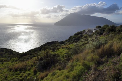 Italy, Sicily, Aeolian Islands, listed as World Heritage by UNESCO, Lipari Island, Northwest coast in Quattropani, Salina Island and Filicudi Island in the background
