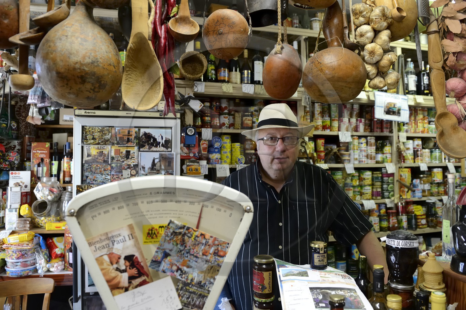 France, Haute Corse, Corte, the epicerie Casa Curtinese hold by Jean-Marie Ghionga (with the white hat),  a shop of corsican specialities