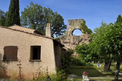 France, Var, Frejus, Forum Julii, the Roman aqueduct of the 1st century BCE built into the eastern ramparts of the Roman city towards the Rome gate, it fences the garden of a particular house