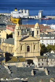 France, Haute Corse, Bastia, St Jean Baptiste Church and the commercial harbor in the background