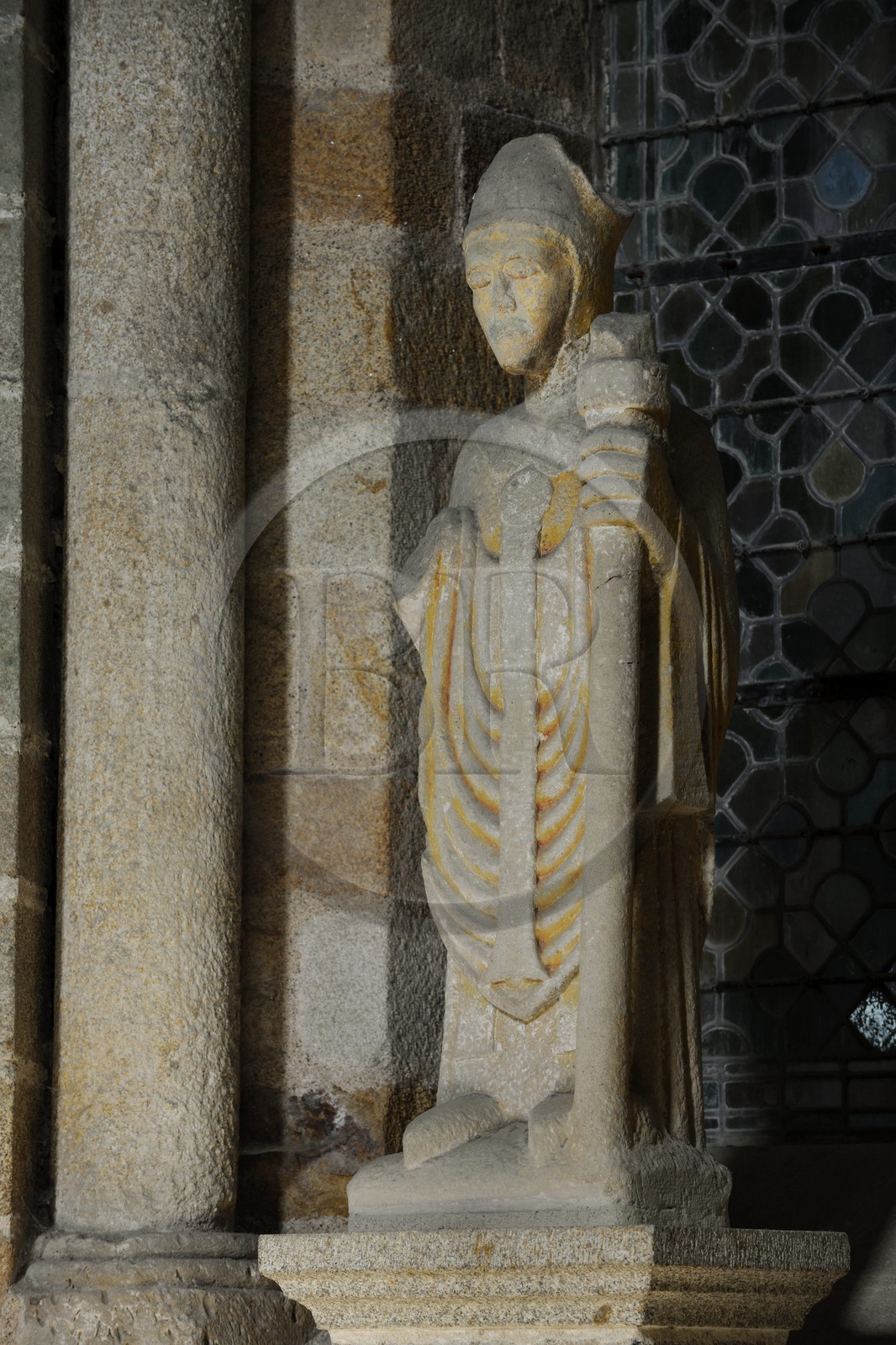 France, Manche, the abbey of Mont Saint Michel, listed as World Heritage by UNESCO, Abbey Church, statue made of granite of the founder of the Abbey, the archbishop of Avranche, Saint Aubert