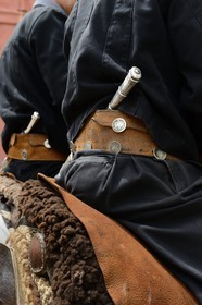 Argentina, Buenos Aires Province, San Antonio de Areco, Tradition Day festival (Dia de Tradicion) close up at a gaucho's traditional belt and the facon (wide and long knife)