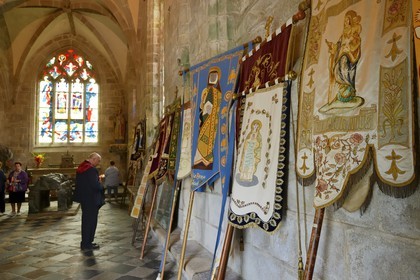France, Finistere, Locronan, labelled Les plus Beaux Villages de France (The Most Beautiful Villages of France), the banners of neighboring parishes in Peniti chapel adjacent to the Saint Ronan church during the religious ceremony that precedes the procession of the Tromenie