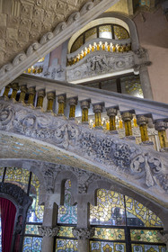Spain, Catalonia, Barcelona, Palau de la Musica Catalana (Catalan Music Palace), concert hall designed by the architect of Catalan modernism Lluis Domènech i Montaner, a UNESCO World Heritage Site, vestibule, the banister of the stairs in finely worked stone and supported by balusters in transparent yellow glass